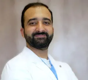 Portrait of Dr. Hussain Akam